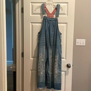Cute wide legged cropped overalls. Embroidered on thighs. Blue jeans material